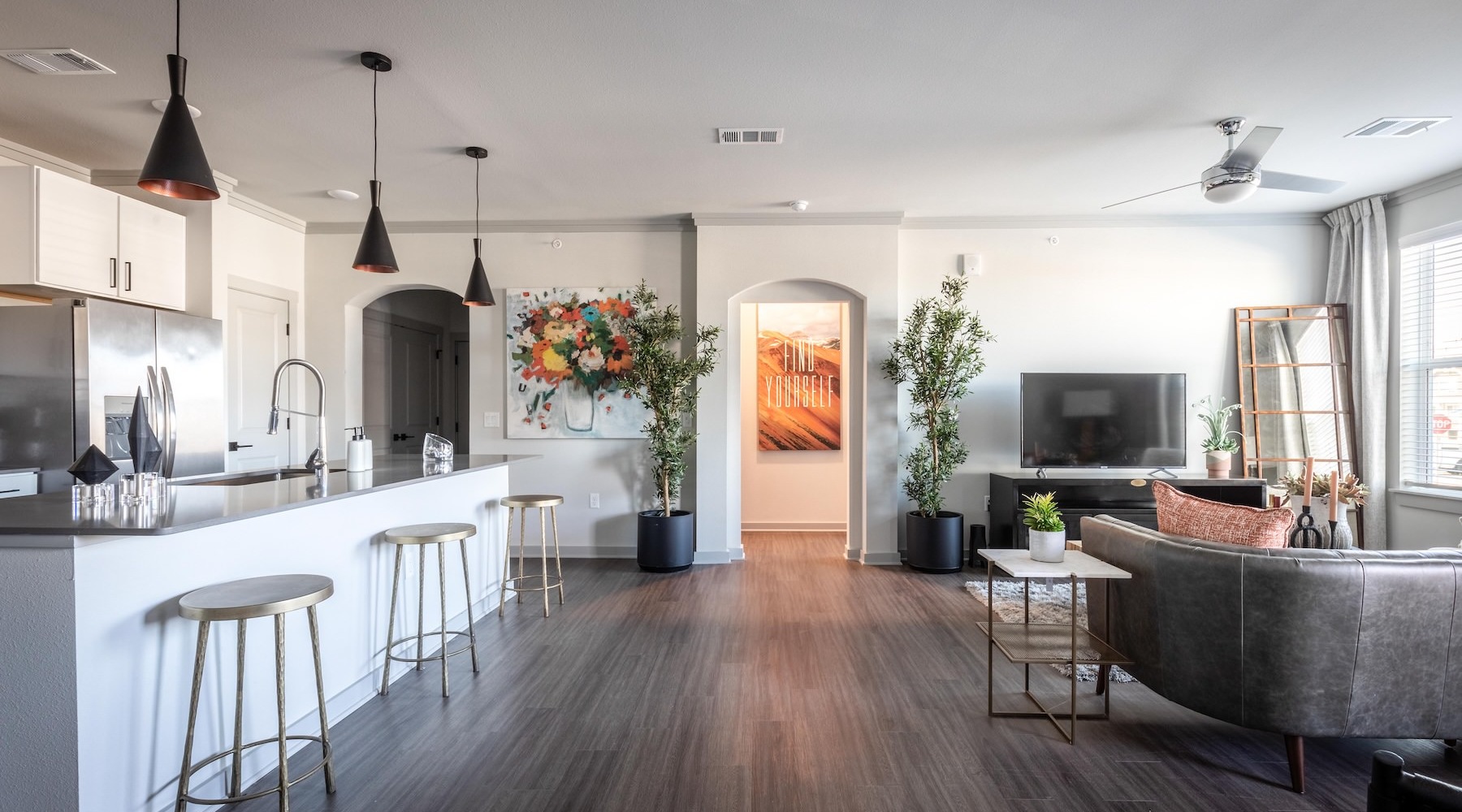 living room with furniture and kitchen