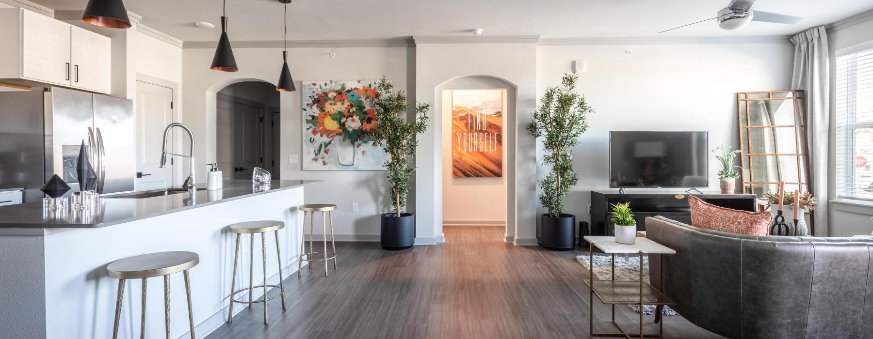 a kitchen with a wood floor